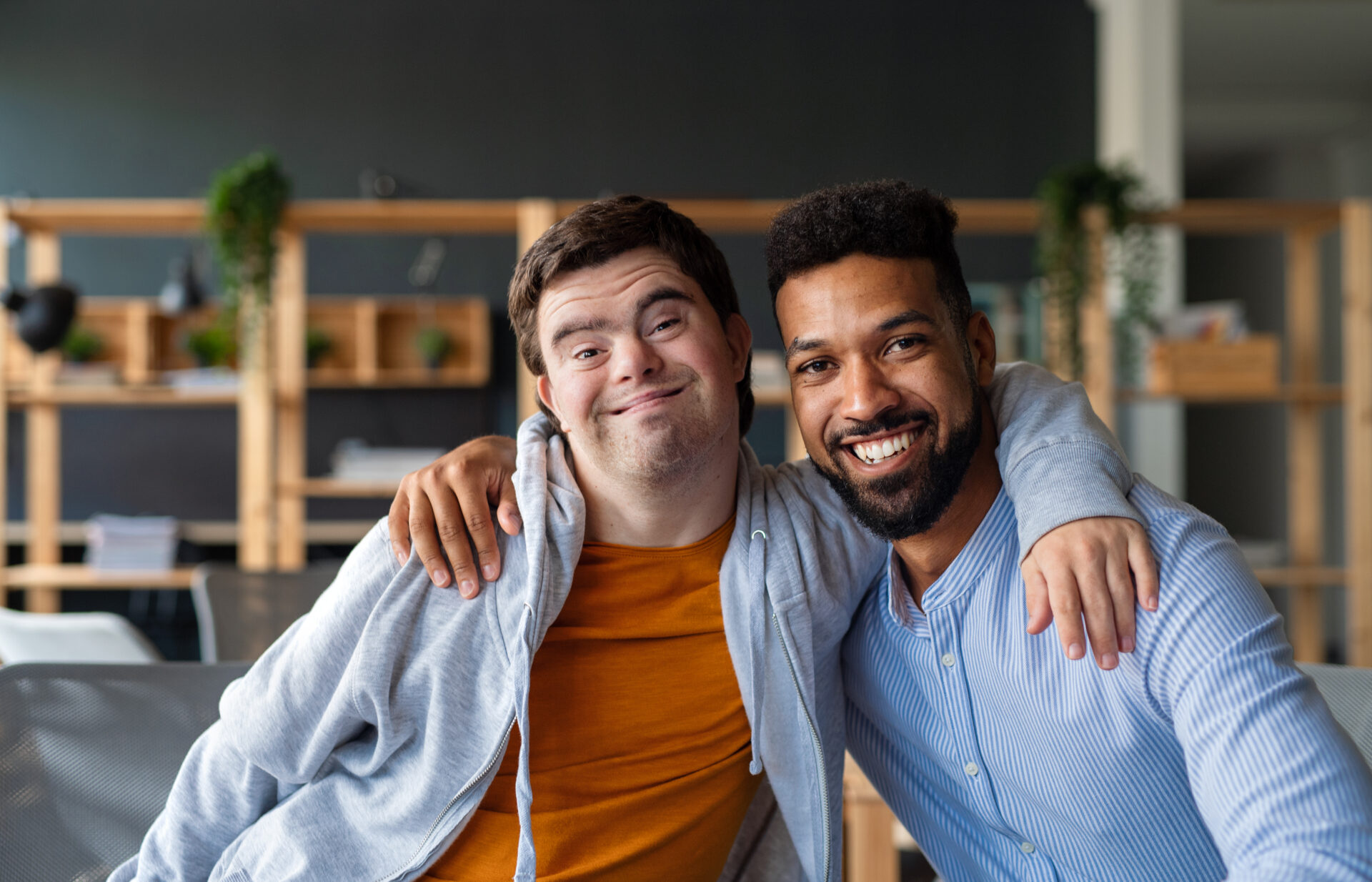 Young man with Down syndrome and his supported living worker