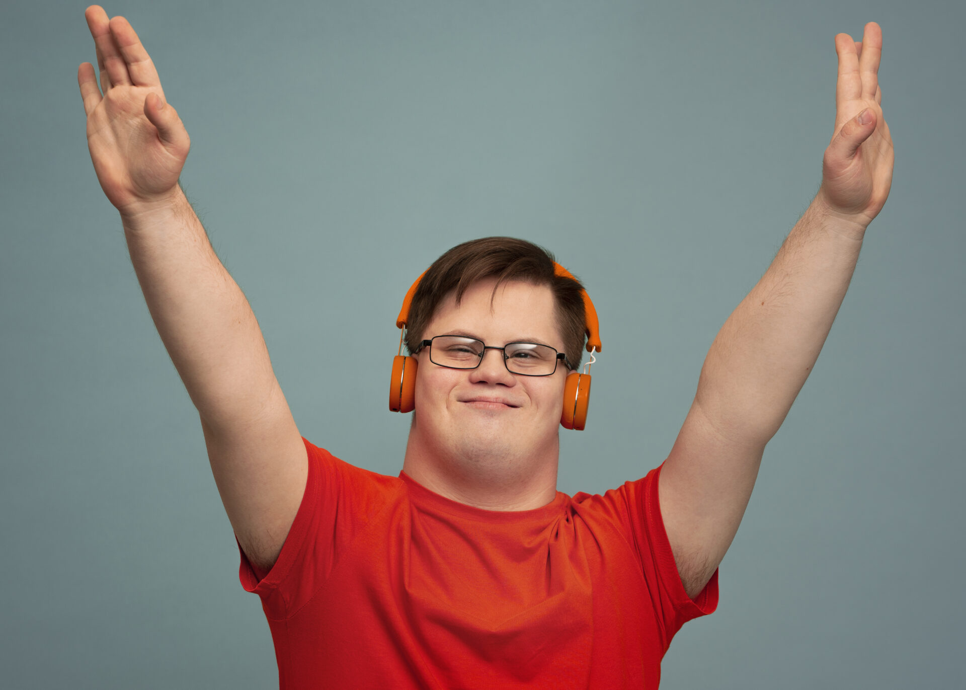 Portrait of a happy disabled man with down syndrome